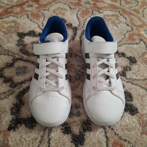 Adidas Grand Courts 2.0 white sneakers.